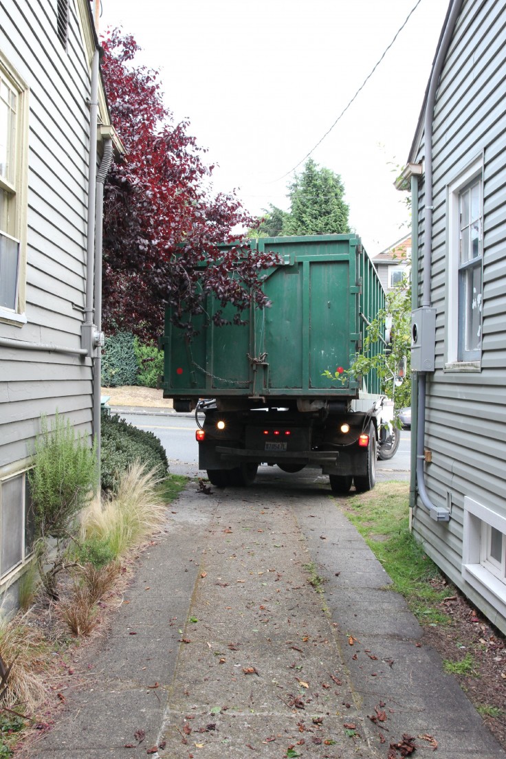 The Grit and Polish - garage demo day dumpster delivery.jpg