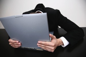 Hide head behind laptop