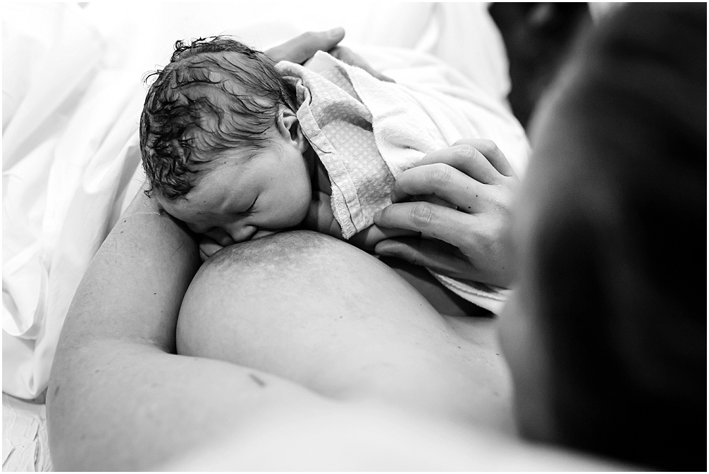Breast crawl photos taken by birth photographer in Denver