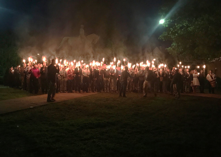 Citizens gather at Lee Park in Charlottesville, Va., to protest plans to remove a monument to Robert E. Lee. (Allison Wrabel / The Daily Progress, via Associated Press)