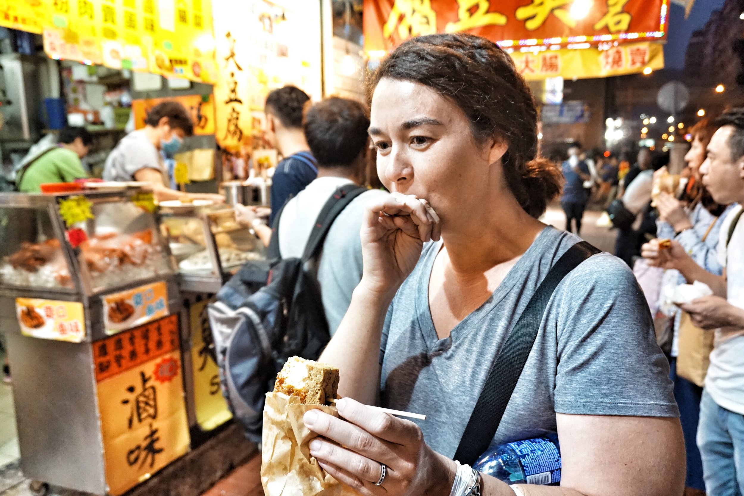 Private tour guide Jess tries the stinky tofu during one of her night tours in Kowloon. The big question is, did she like it!?