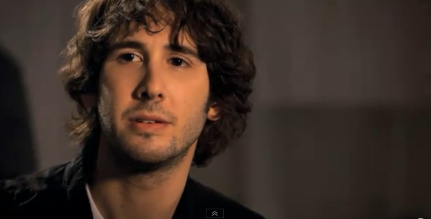 A screencap from the video for Hidden Away, where Josh Groban looks all smouldery and emo.
