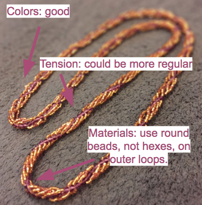 Spiral rope necklace with critique text.