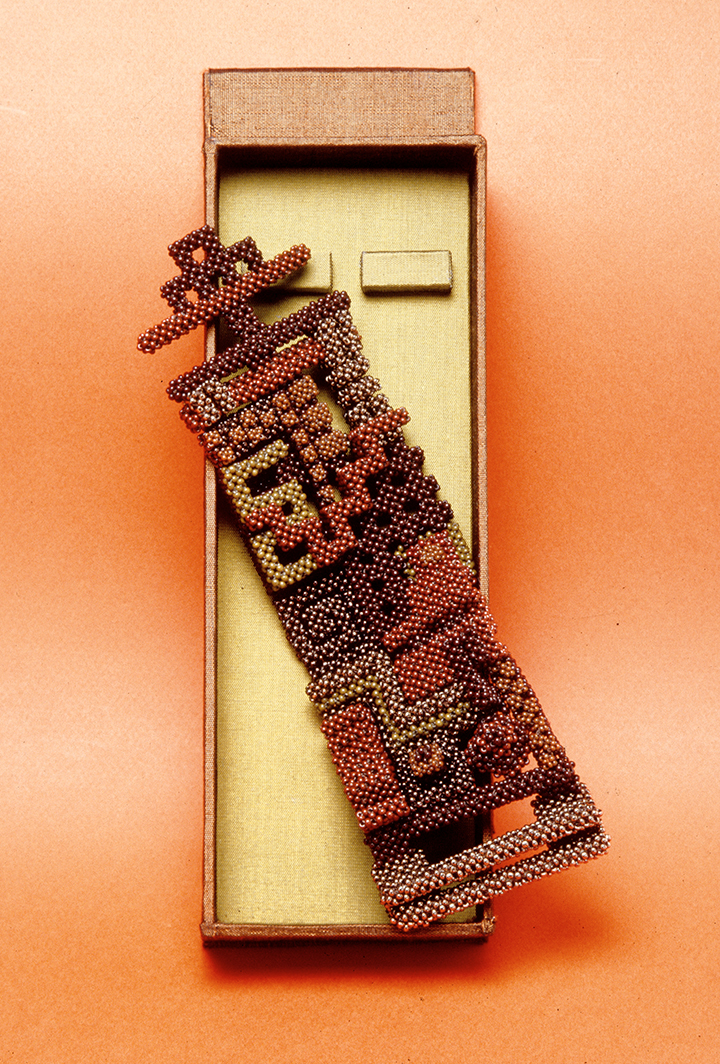 October Bracelet by David Chatt: red, gold, and bronze beads in cubic right-angle-weave, irregularly patterned.