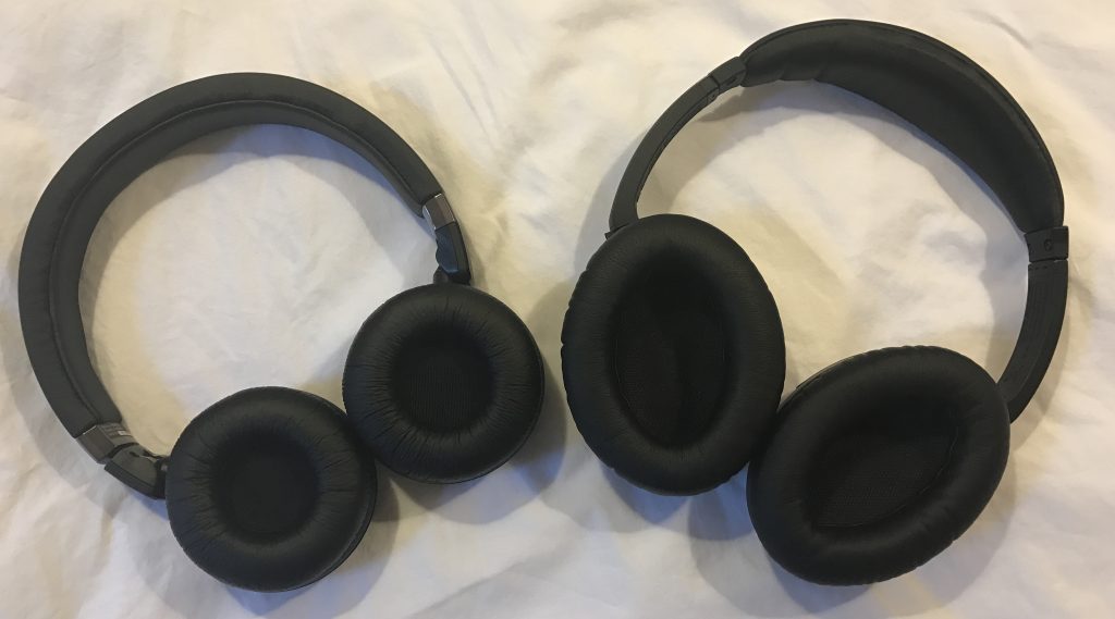 A side-by-side comparison of the earcup sizes of the Philips SHB8850NC headphones with the Bose QuietComfort 15 headphones