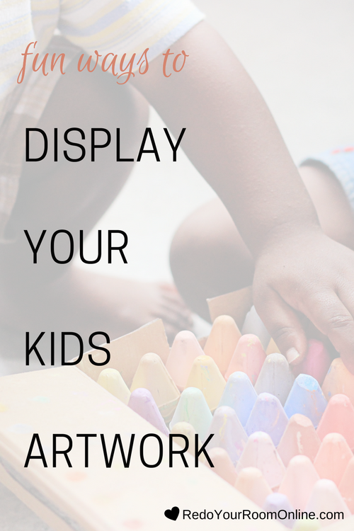 Fun Ways To Display Kids Artwork Let me guess.  You don't know what to do with your kids artwork besides smack it up on the fridge with a magnet, but you want options.  And by options, I don't mean getting rid of it and tossing it (I would never encourage you to do that...coughs and clears throat).  I'm talking more about fun ways to display kids artwork. Repin and click through for the interior design tips. 