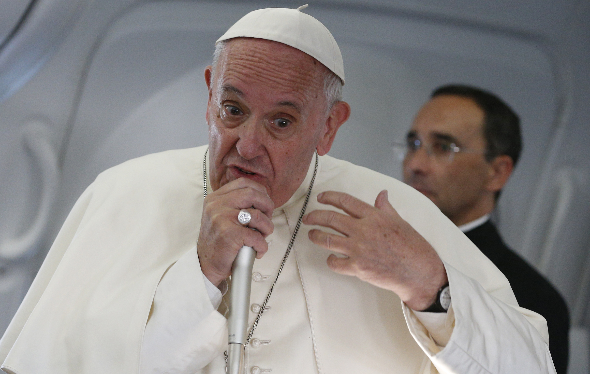 Pope Francis speaks with journalists aboard his July 31 flight from Krakow, Poland, to Rome. (CNS photo/Paul Haring) 