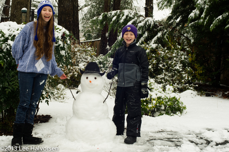 Kelsey & Kyle Holding Snowman's Hands
