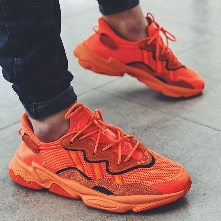 adidas ozweego orange on feet