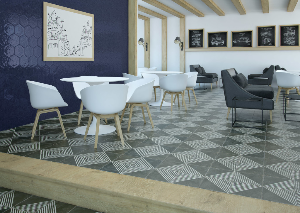This attractive geometric floor tile is a modern example of cement/hydraulic/inlaid/encaustic tile by Peronda