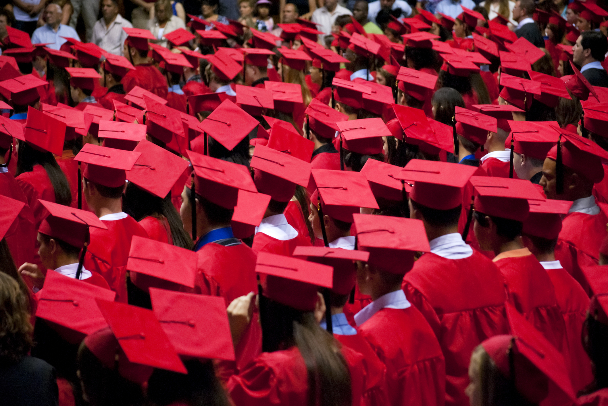 Graduates-red-cap-and-gown