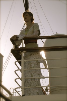Eva at the railing..
