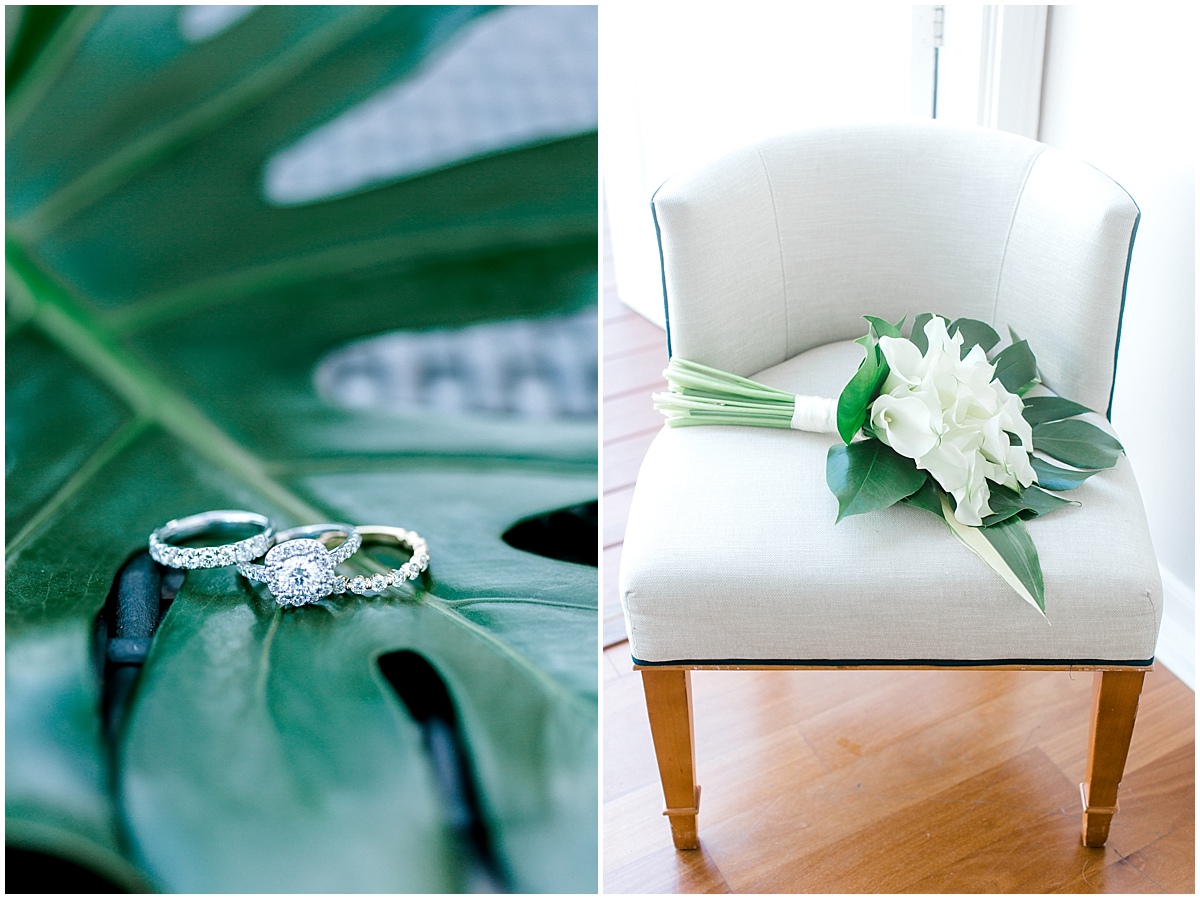 Gorgeous wedding at Presidio Yacht Club brides bouquet laying on white chair and rings on big hawaiian green leaf