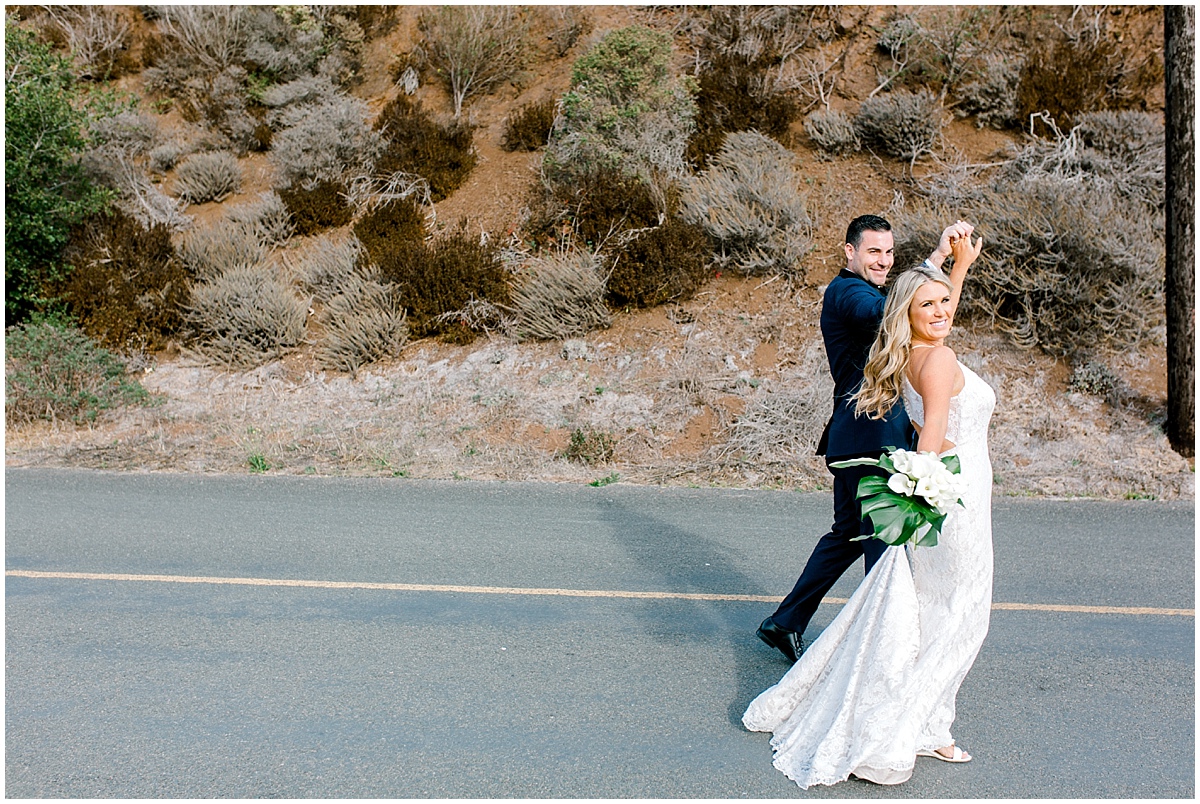 Gorgeous wedding at Presidio Yacht Club bride and groom walking on road near Presidio