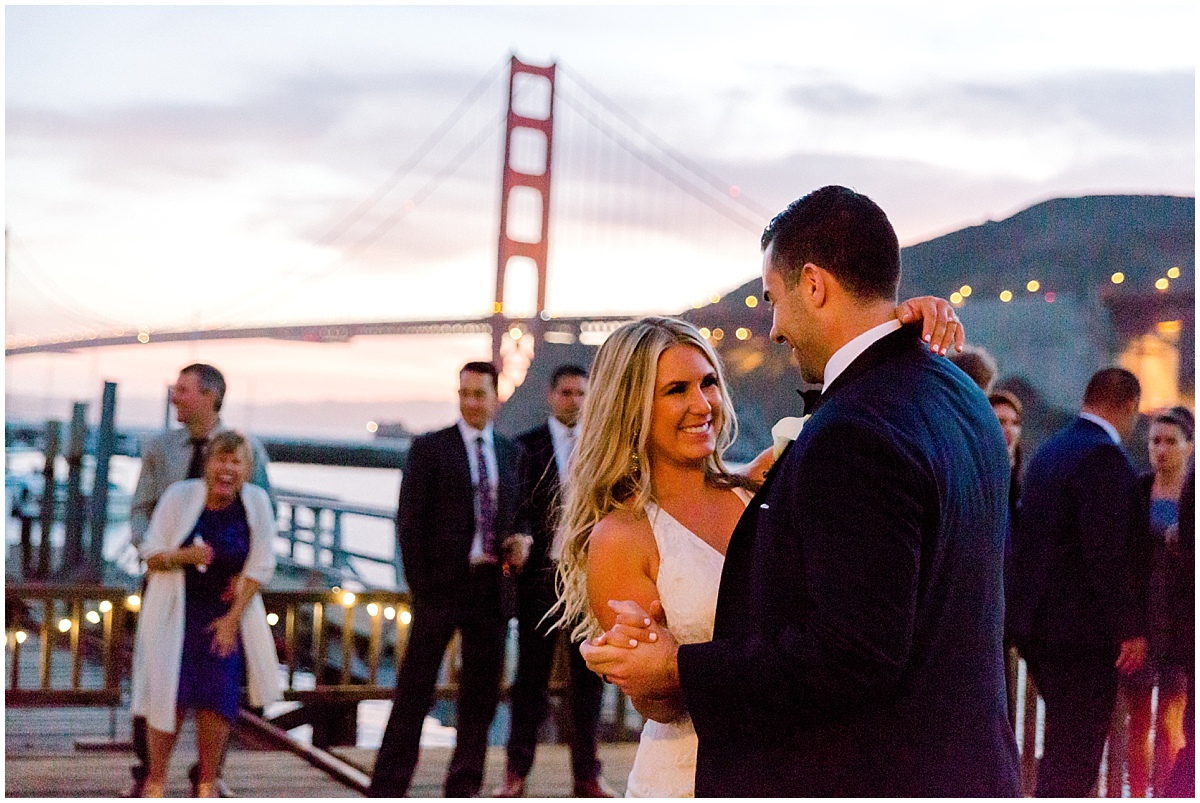 Gorgeous wedding at Presidio Yacht Club first dance at sunset