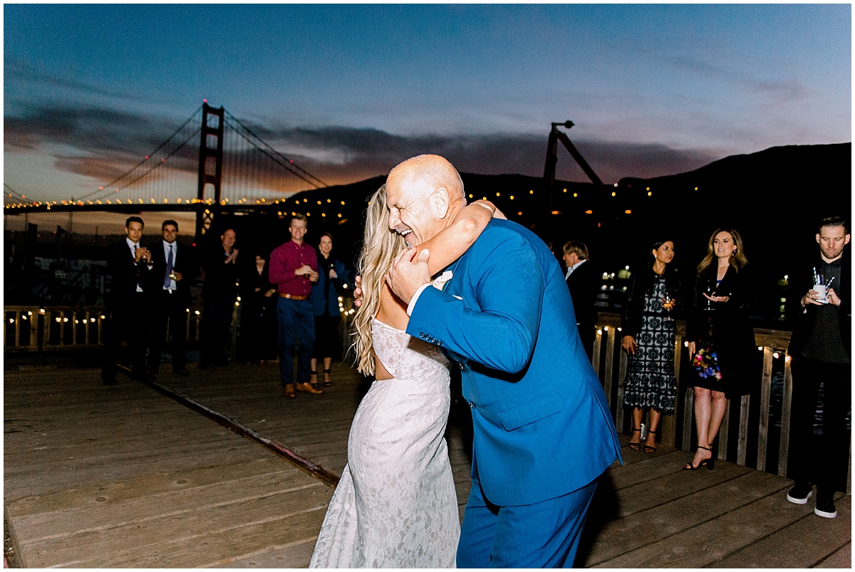 Gorgeous wedding at Presidio Yacht Club bride and Dad hugging after dance