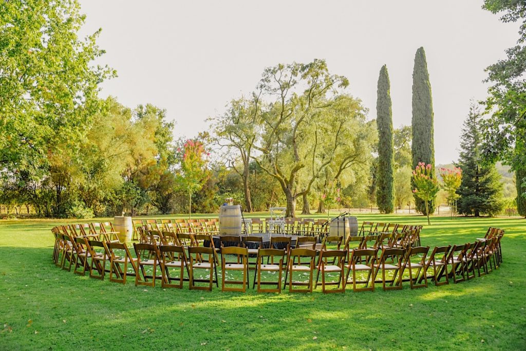 Same sex wedding at Charles Krug Winery in St Helena California spiral ceremony seating