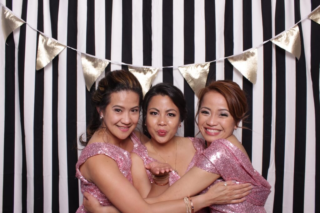 Calgary wedding guests strike a pose for this calgary based photo booth