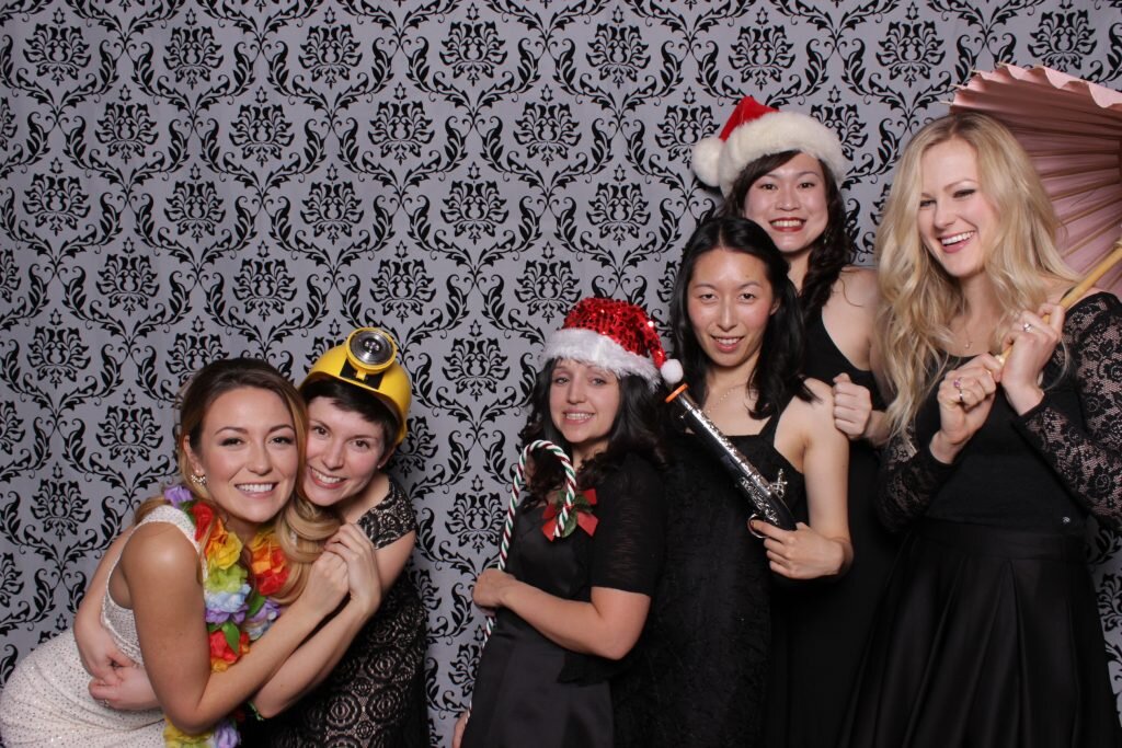 a girl squad rocks this christmas party event photo booth