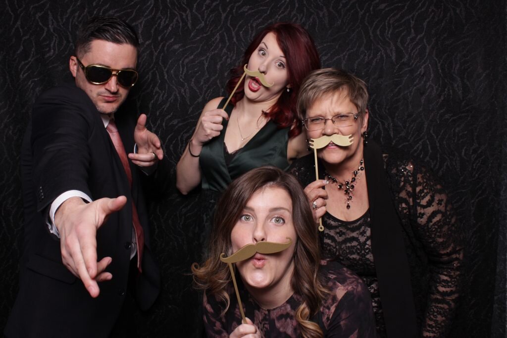 guests in a wedding reception photo booth in calgary