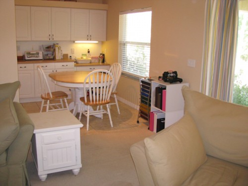 the kitchen eating area seen from the living room