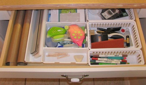 the kitchen desk drawer set up for scrapbook storage