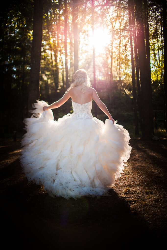 bride-wedding-dress-dancing-sun-flare