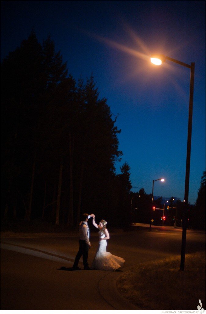 wedding reception bride and groom portraits under streetlamp