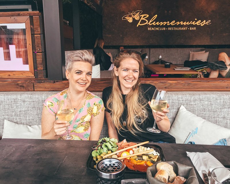 two women with charcuterie board at Blumenweise