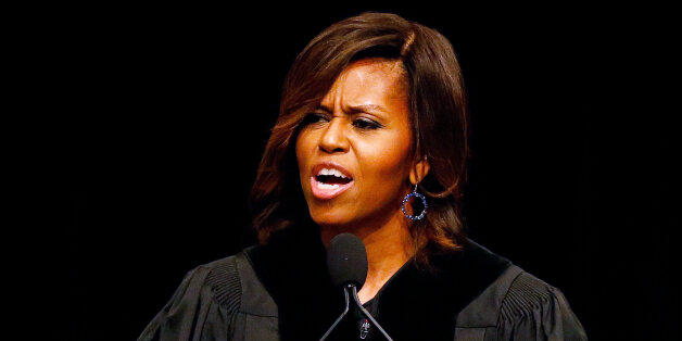 First lady Michelle Obama delivers the commencement address to graduates of Dillard University in New Orleans, Saturday, May 10, 2014. (AP Photo/Jonathan Bachman)