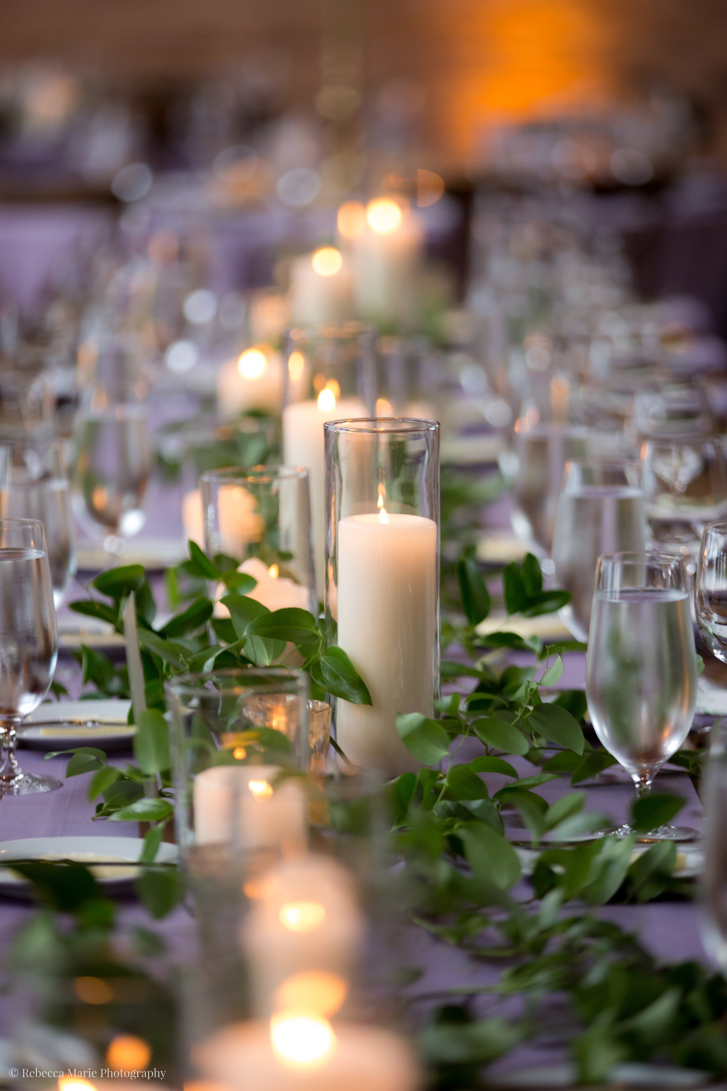 Purple wedding table with candles