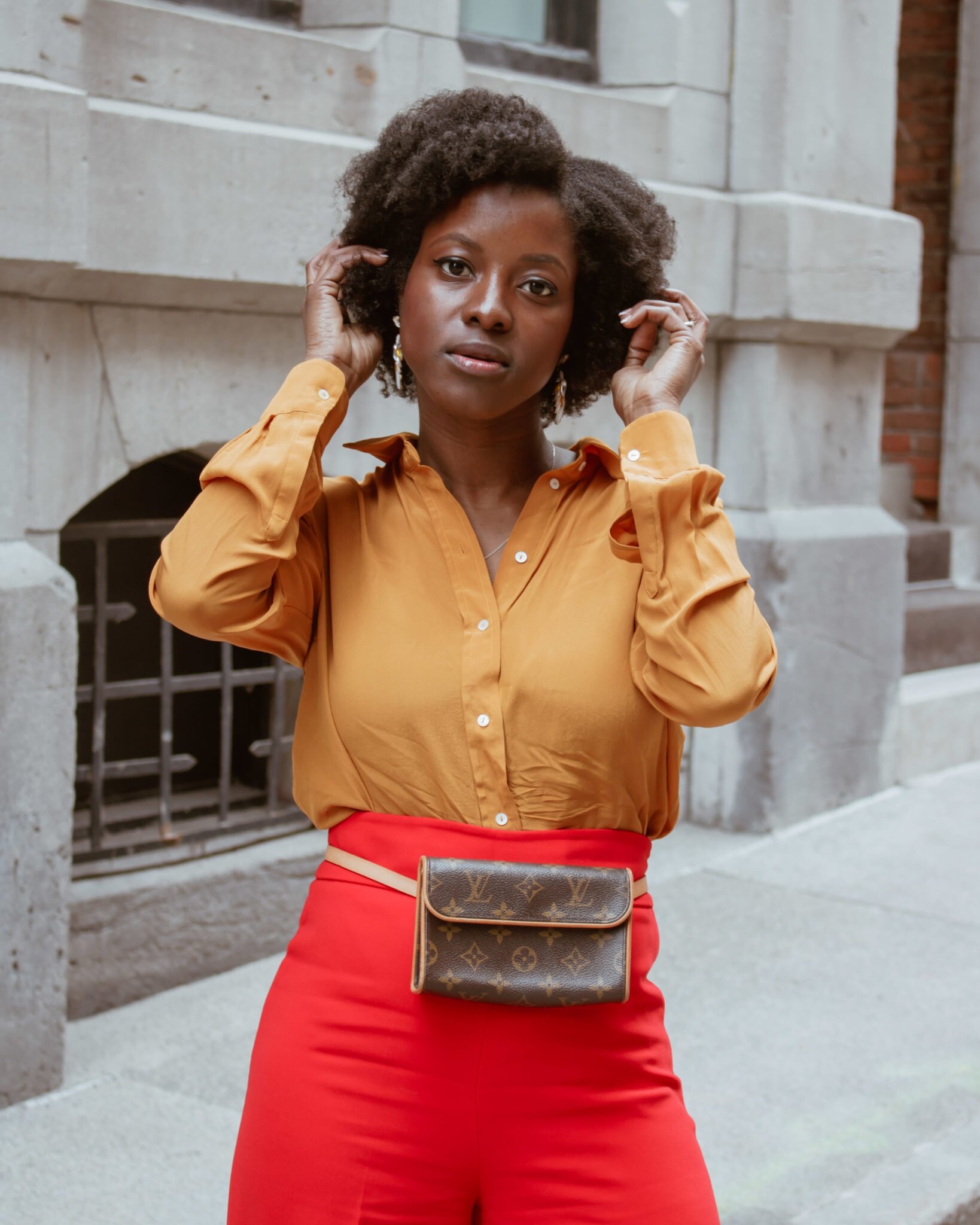 Natural hair blogger ~~ Zara red palazzo pants ~~ how to style Louis Vuitton Florentine Fanny pack ~~ Petite and Bold ~~ Street style fashion ~~ luxury minimalist blog