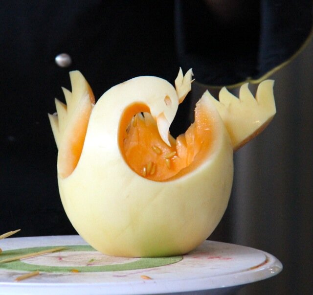 Chef Ray L. Duey, carving a swan center piece