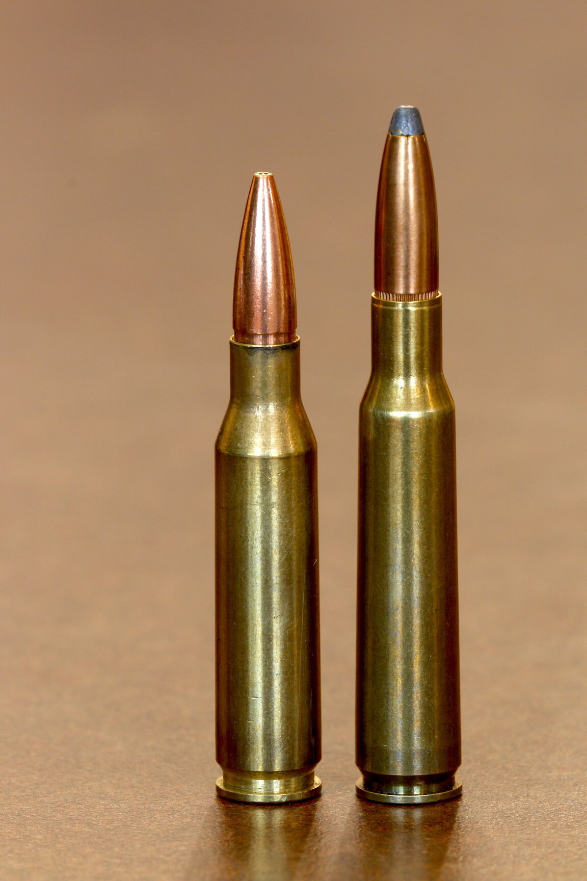 7mm-08 Remington cartridge beside a 7x57 Mauser, its distant cousin., as is the 270 Winchester. 