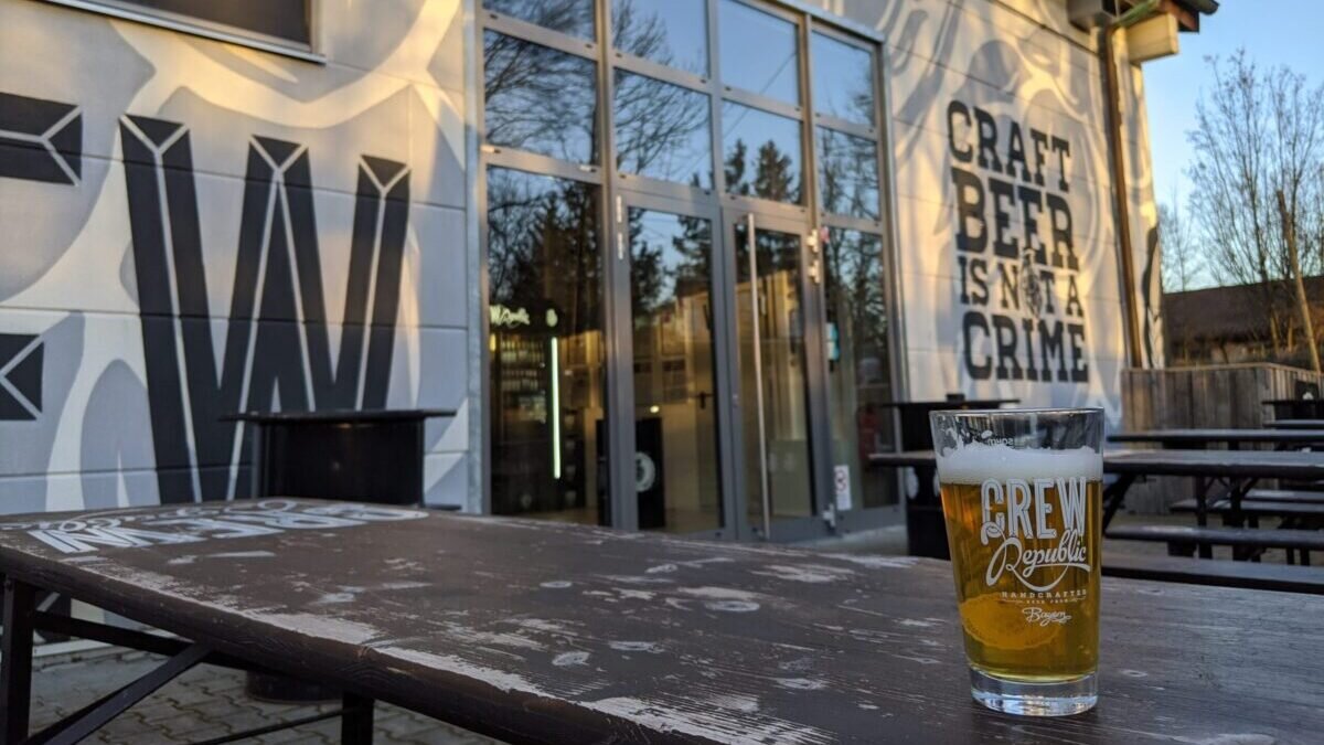 A picture of a beer in front of Crew Brew in Munich