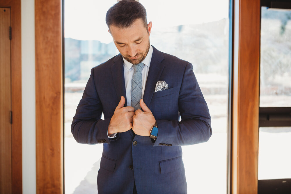 The groom moments before seeing his bride adjusting his navy blue suit #tealawardphotography #texasweddings #amarillophotographer #amarilloweddingphotographer #emotionalphotography #intimateweddingphotography #weddingday #weddingphotos #texasphotographer #inspiredwedding #intimatewedding #weddingformals #bigday #portraits 