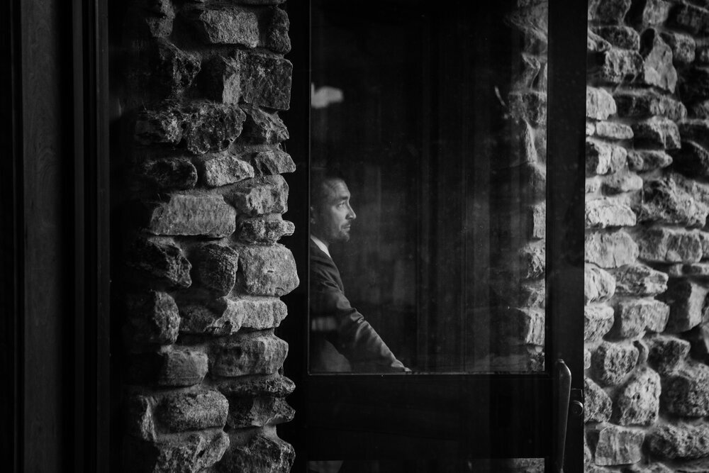  Black and white photo of the groom waiting for his gorgeous bride on their wedding day #tealawardphotography #texasweddings #amarillophotographer #amarilloweddingphotographer #emotionalphotography #intimateweddingphotography #weddingday #weddingphotos #texasphotographer #inspiredwedding #intimatewedding #weddingformals #bigday #portraits 