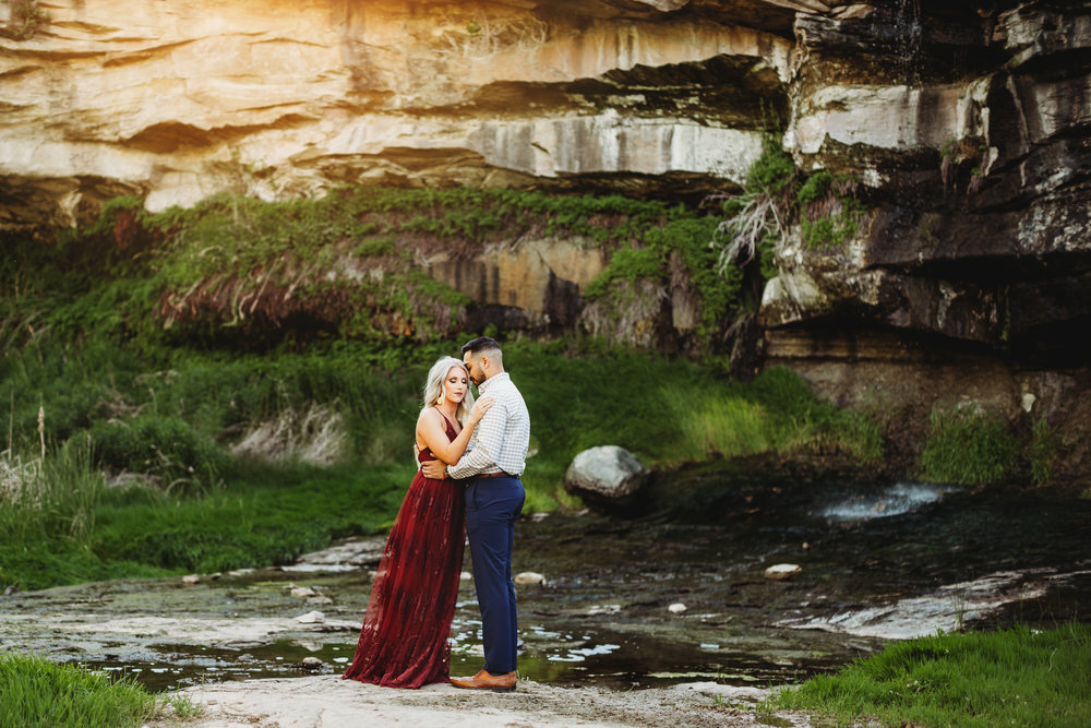  Wildlife refuge with greenery in gorge and engaged couple standing in the middle #tealawardphotography #texaslocationchoice #amarillophotographer #amarillofamilyphotographer #emotionalphotography #engagementphotography #couplesphotography #pickingaphotosessionlocation #whatsimportant #everythingtogether #pickingcolorsforphotos #location #photosessionlocation 