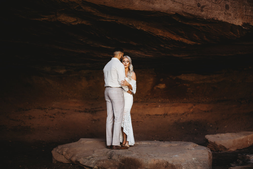  Standing together under red sandstone in white neutral colors #engagementphotos #riverfalls #engaged #personality #amarillotexas #engagementphotographer #lifestylephotos #amarillophotographer #locationchoice #texasengagementphotos #engagment #tealawardphotography #wildliferefuge 