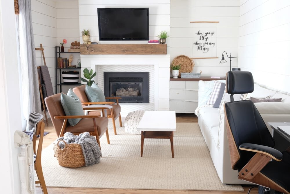 living room with midcentury modern pieces and shiplap