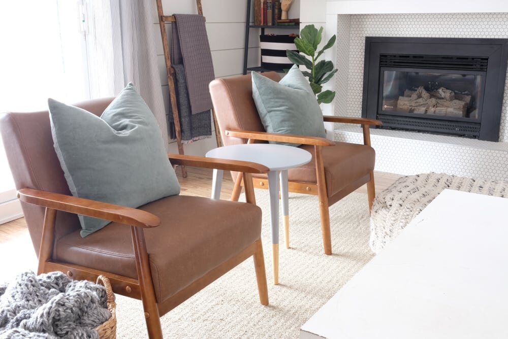 living room decor with brown leather midcentury modern chairs