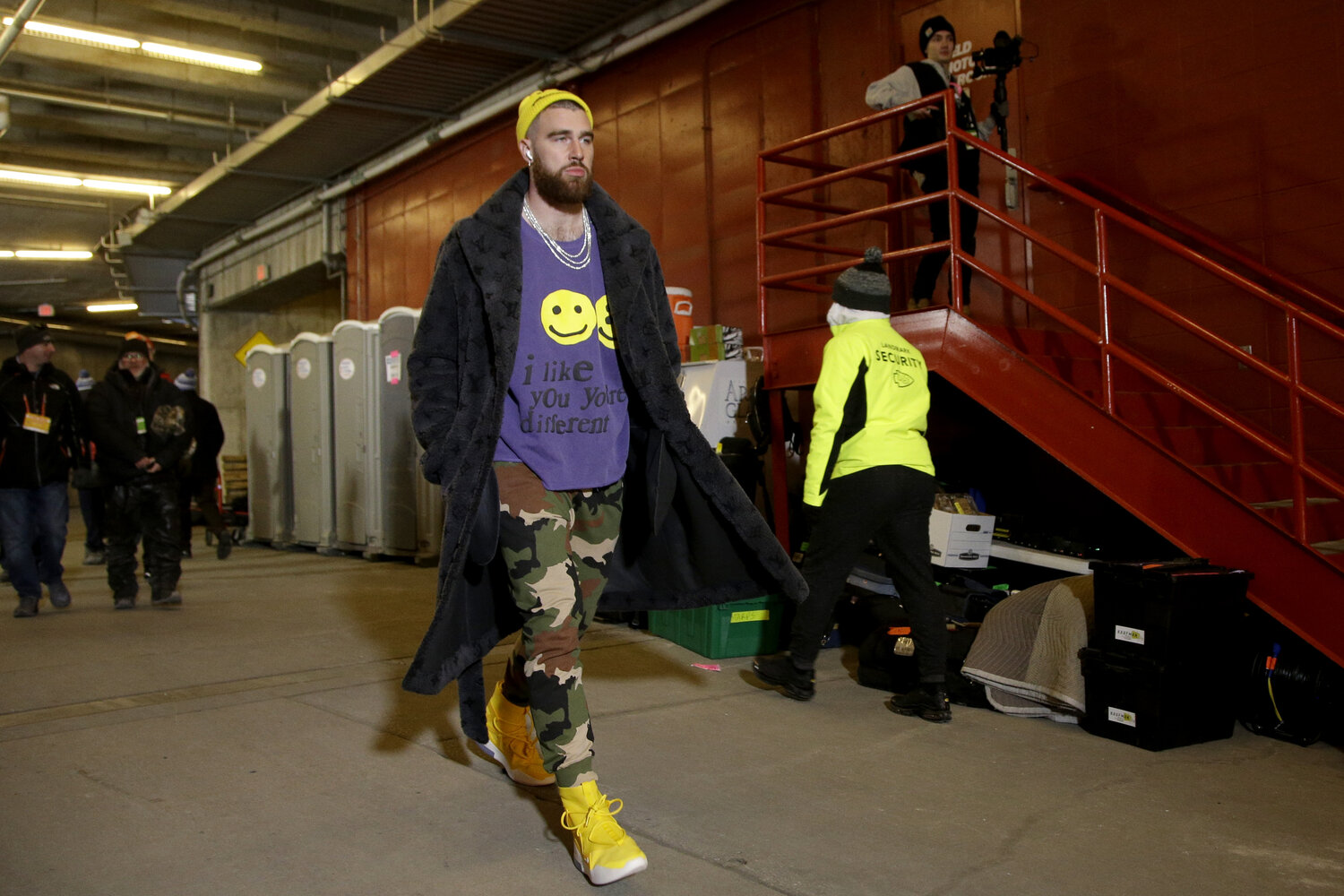 Travis Kelce with the Louis Vuitton camo fit for the Super Bowl