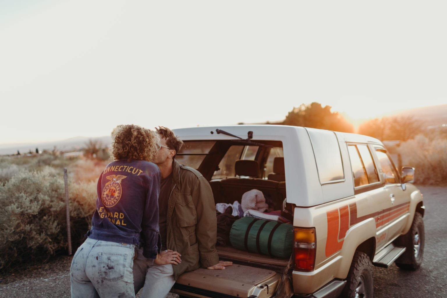 Couple Kissing in vintage truck