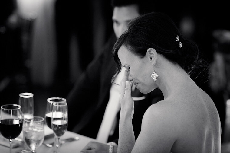 Bride cries during a touching toast.