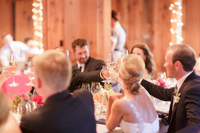Bride toasts groomsmen.