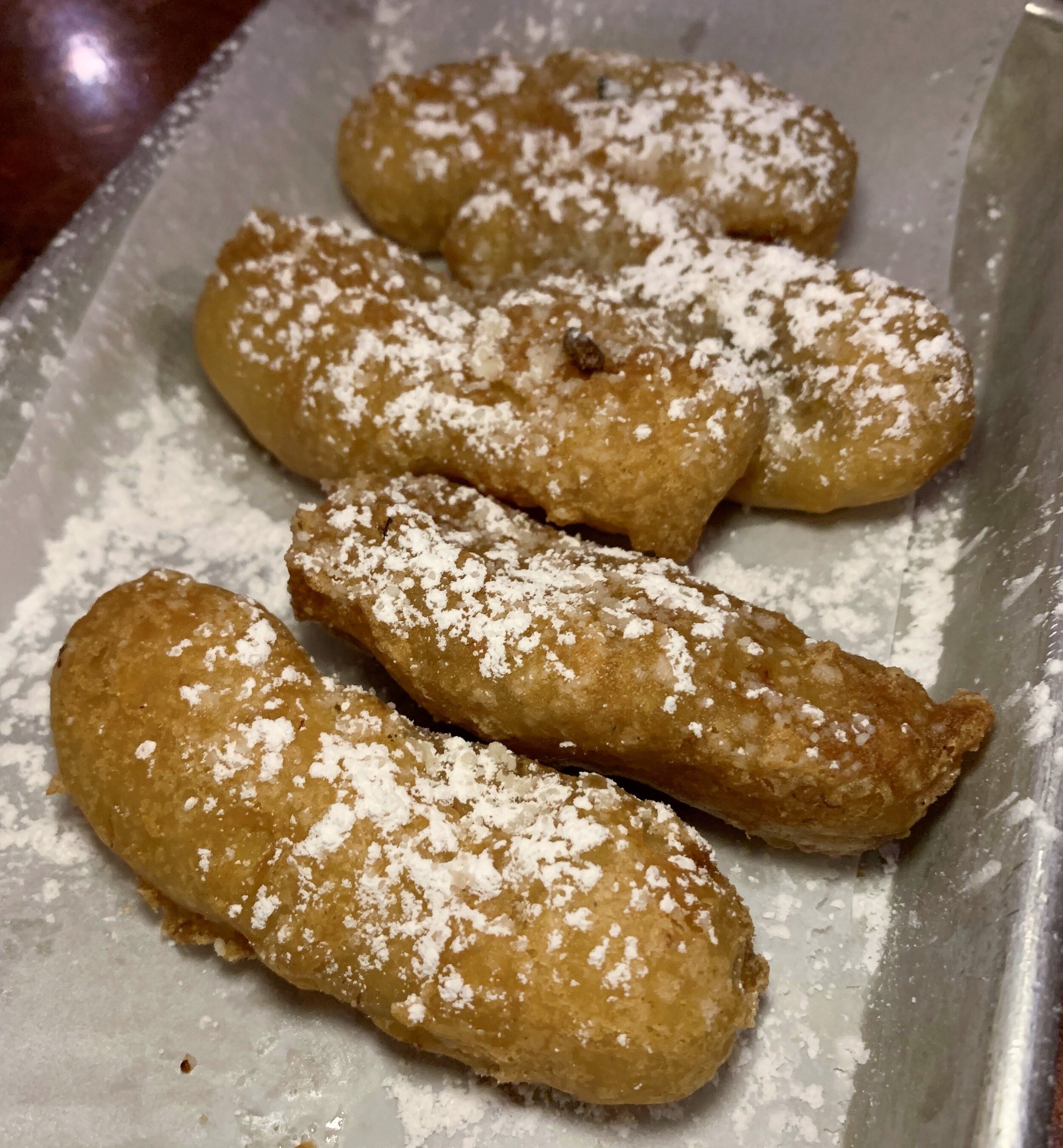 Fried bananas dusted with powdered sugar at Bar Luchador's I Can't Believe It's Vegan night