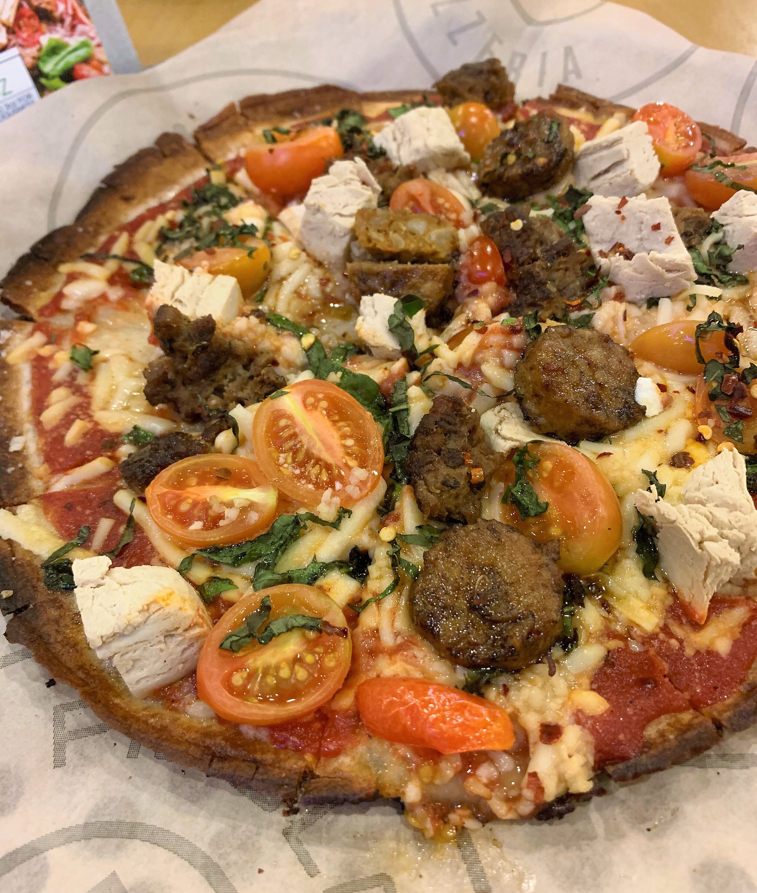 Pieology Pizzeria vegan and gluten free crust with Gardein vegan meats plus Daiya cheese