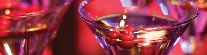 full martini glass with cranberries