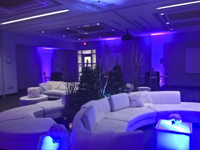 A Snowy Lounge white couches and lounge area