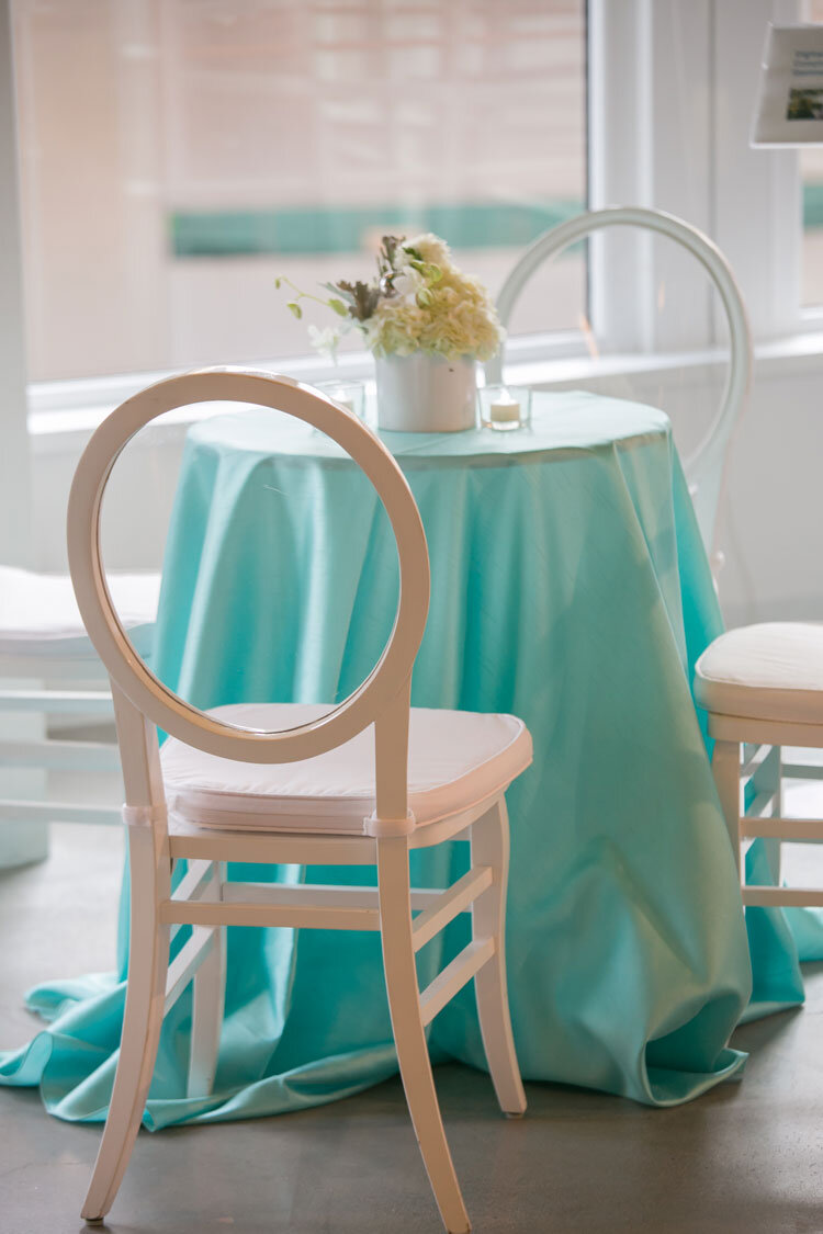 Modern Round Chair Backs with light blue linen holiday party decor